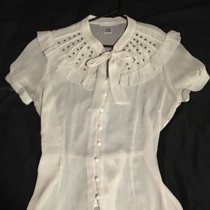 Cream colored tie-collar studded sheer blouse